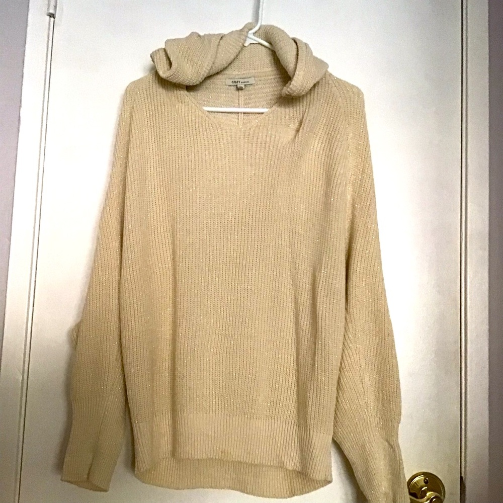 Cozy, casual cream and gold sweater in medium size with a 26 inch length